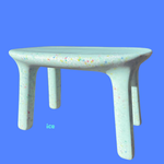Small table with colorful speckles on a blue background