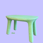 Mint green childrens table on a light purple background with 'Mint' text.