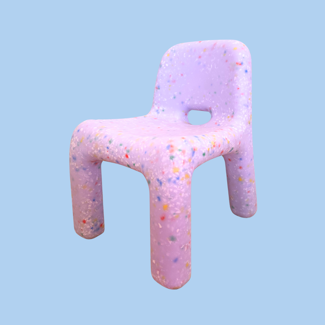 Colorful, textured childrens chair that is Lilac colour and has multi colored speckles throughout