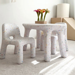Children's furniture set with stools and a small table in a room with a basketball hoop on the wall.