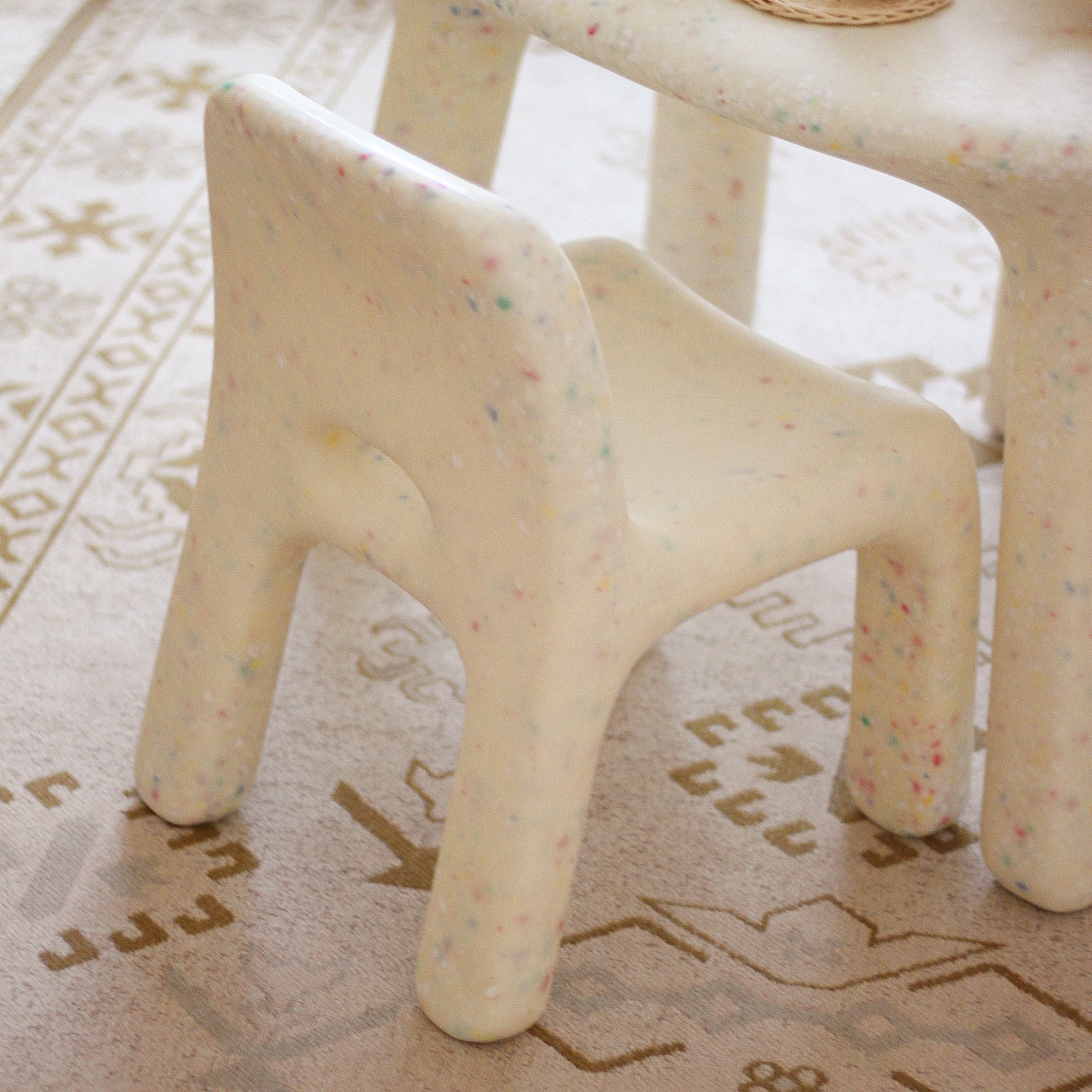 Confetti Sand Chair in playroom on rug